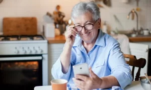 an elderly with hearing loss